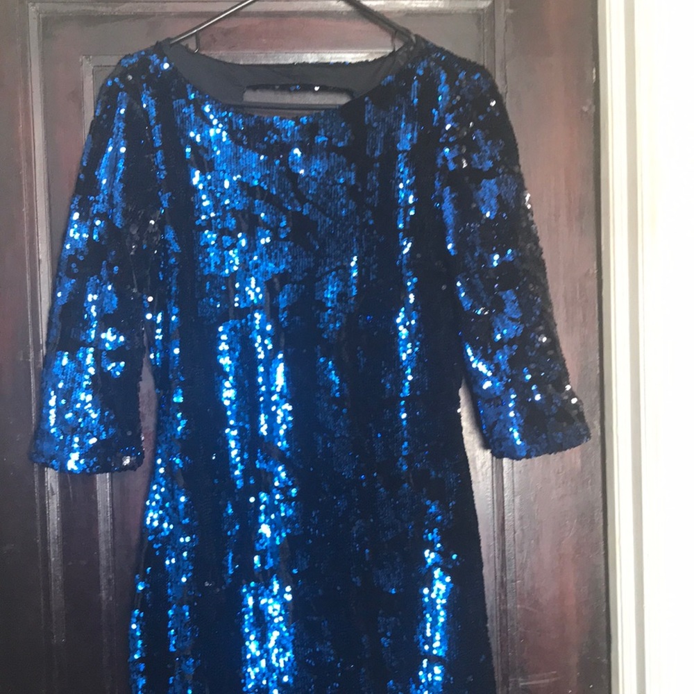 1.New with tags 🏷 blue and black sequined dress.
